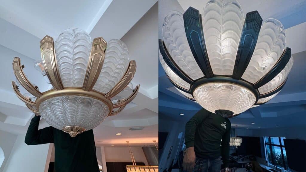 Large Art Deco chandelier with frosted glass feather panels and metal frame.