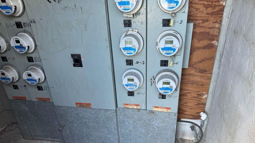 Multi-tenant electrical meter bank installation for commercial or residential buildings.